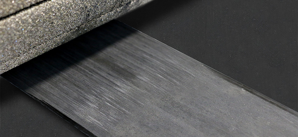 Chamfering carbon fibre